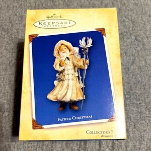Father Christmas Hallmark‎ Keepsake Ornament - White cloak, brown boots and bird